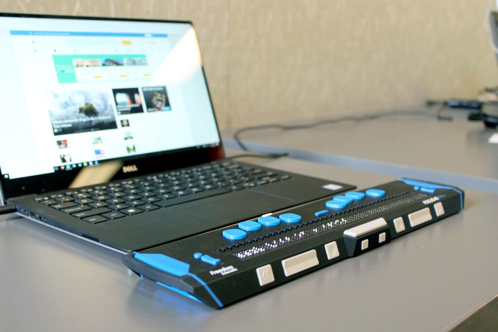 A laptop is sitting on a desk.